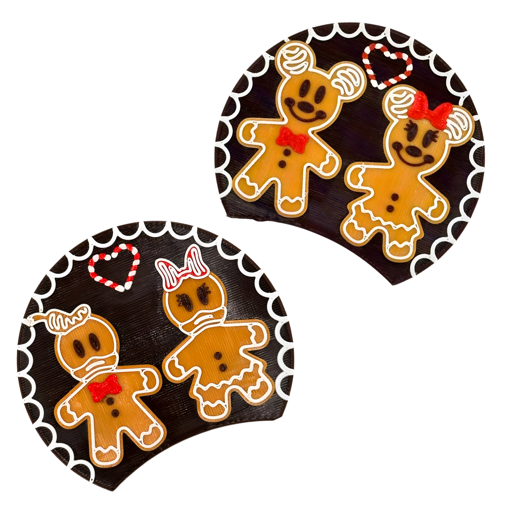 Gingerbread-themed ear inserts with decorative elements on a white background