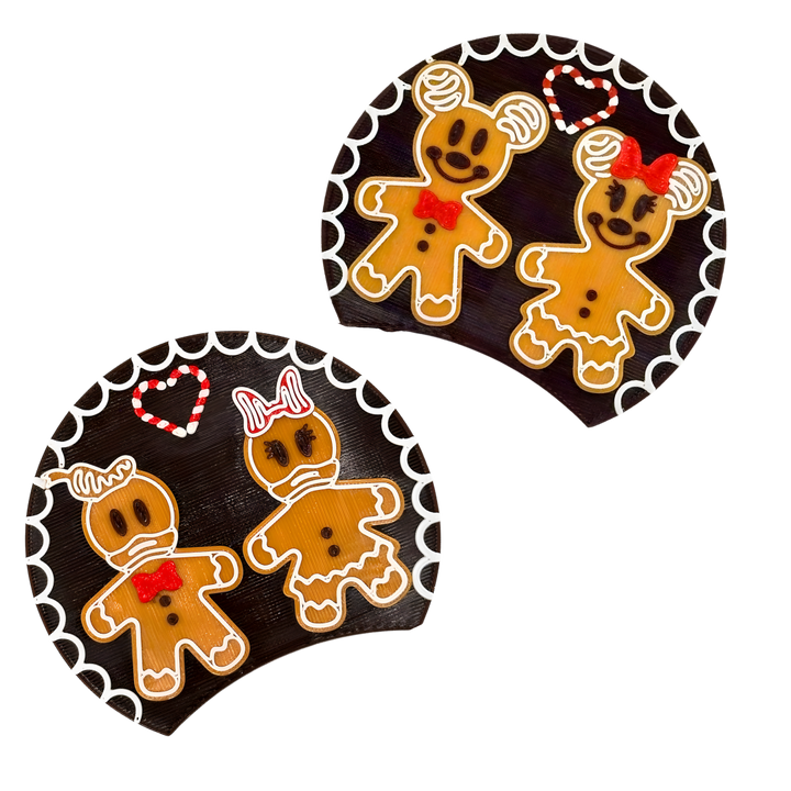 Gingerbread-themed ear inserts with decorative elements on a white background