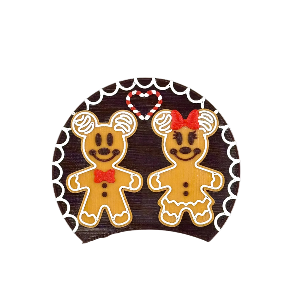A couple of gingerbread mice standing with a candy cane heart between them. 